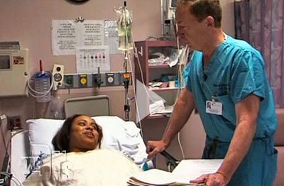 Doctor listening to patient